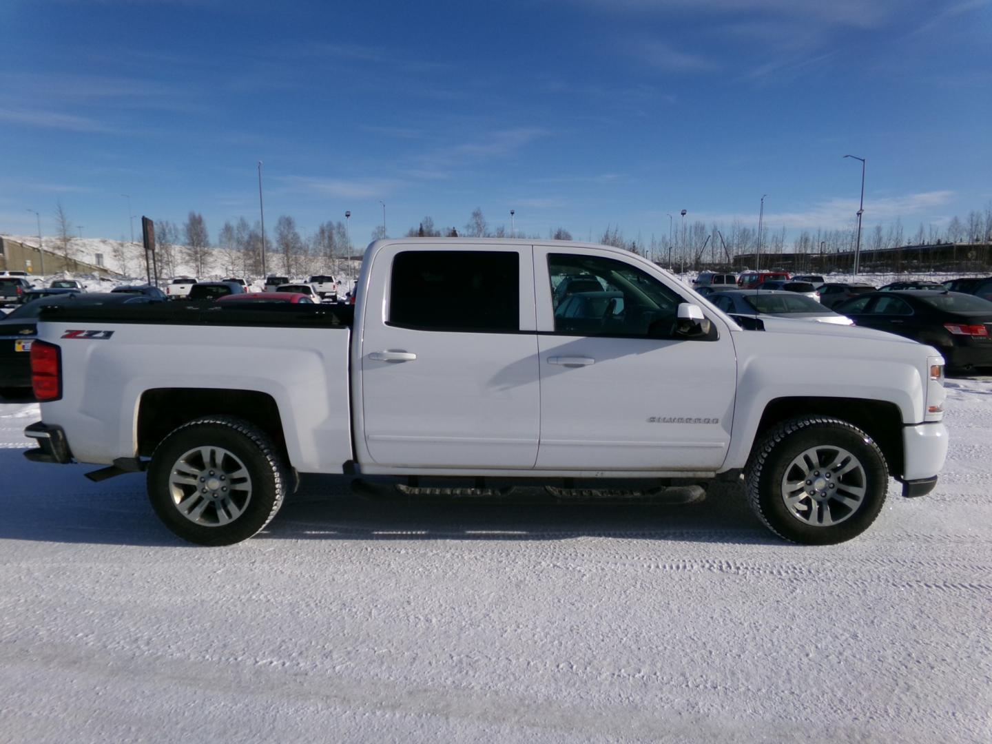 2017 White Chevrolet Silverado 1500 LT Crew Cab 4WD (3GCUKREC5HG) with an 5.3L V8 OHV 16V engine, 6A transmission, located at 2630 Philips Field Rd., Fairbanks, AK, 99709, (907) 458-0593, 64.848068, -147.780609 - Photo#2